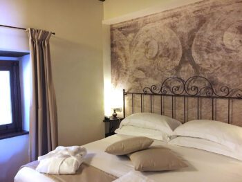 Benedictijns leven reis Umbrie Italie kamer - Giotto Cultuurreizen